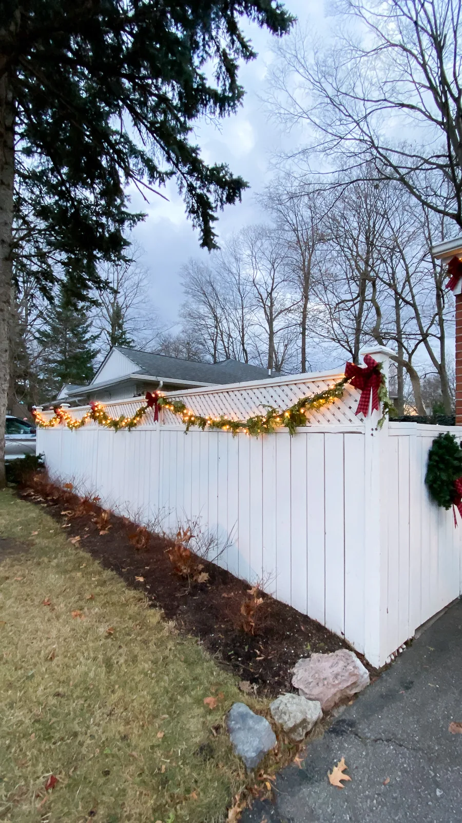 christmas garland on fence