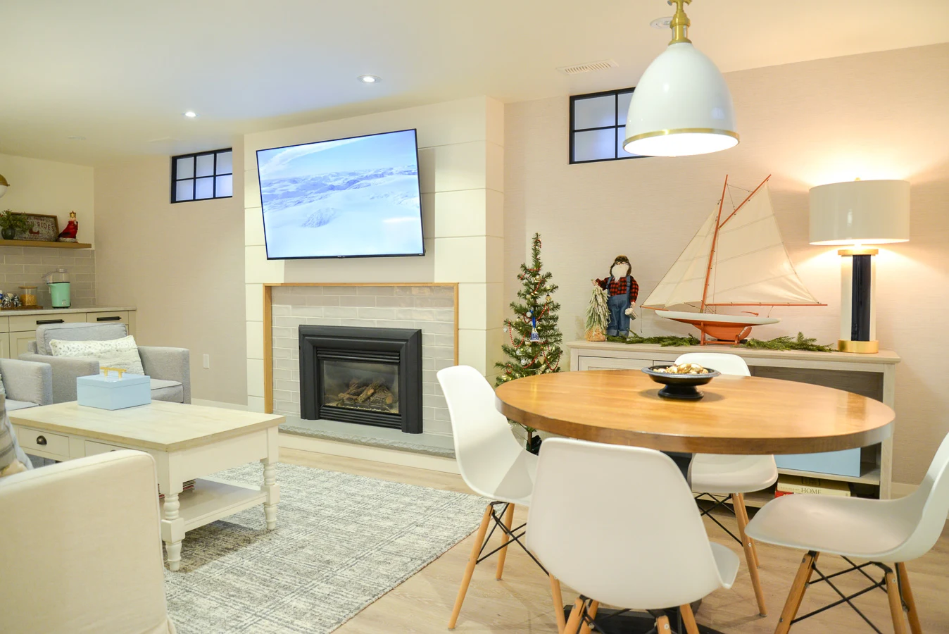 white basement family room with games table