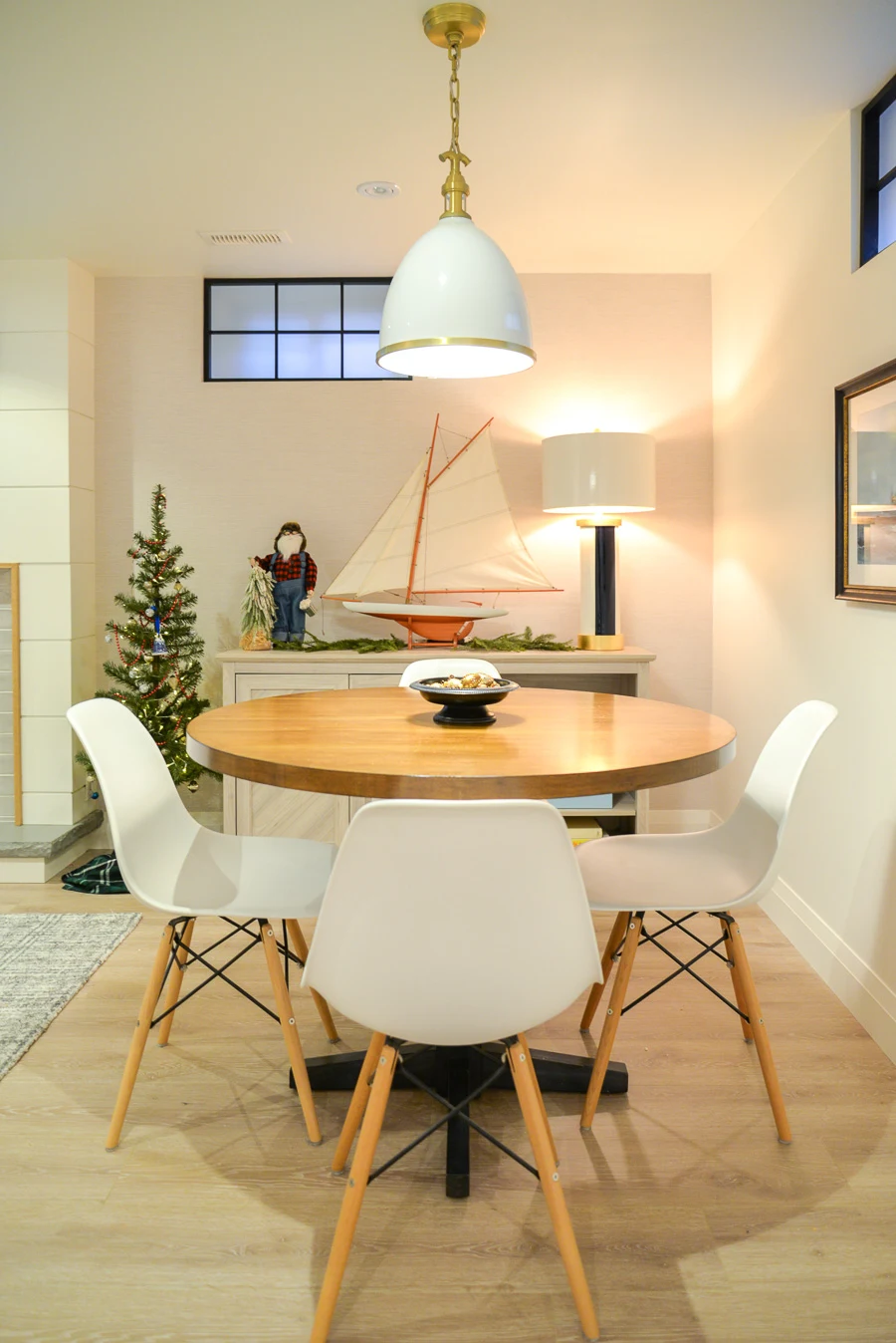 white basement family room with games table