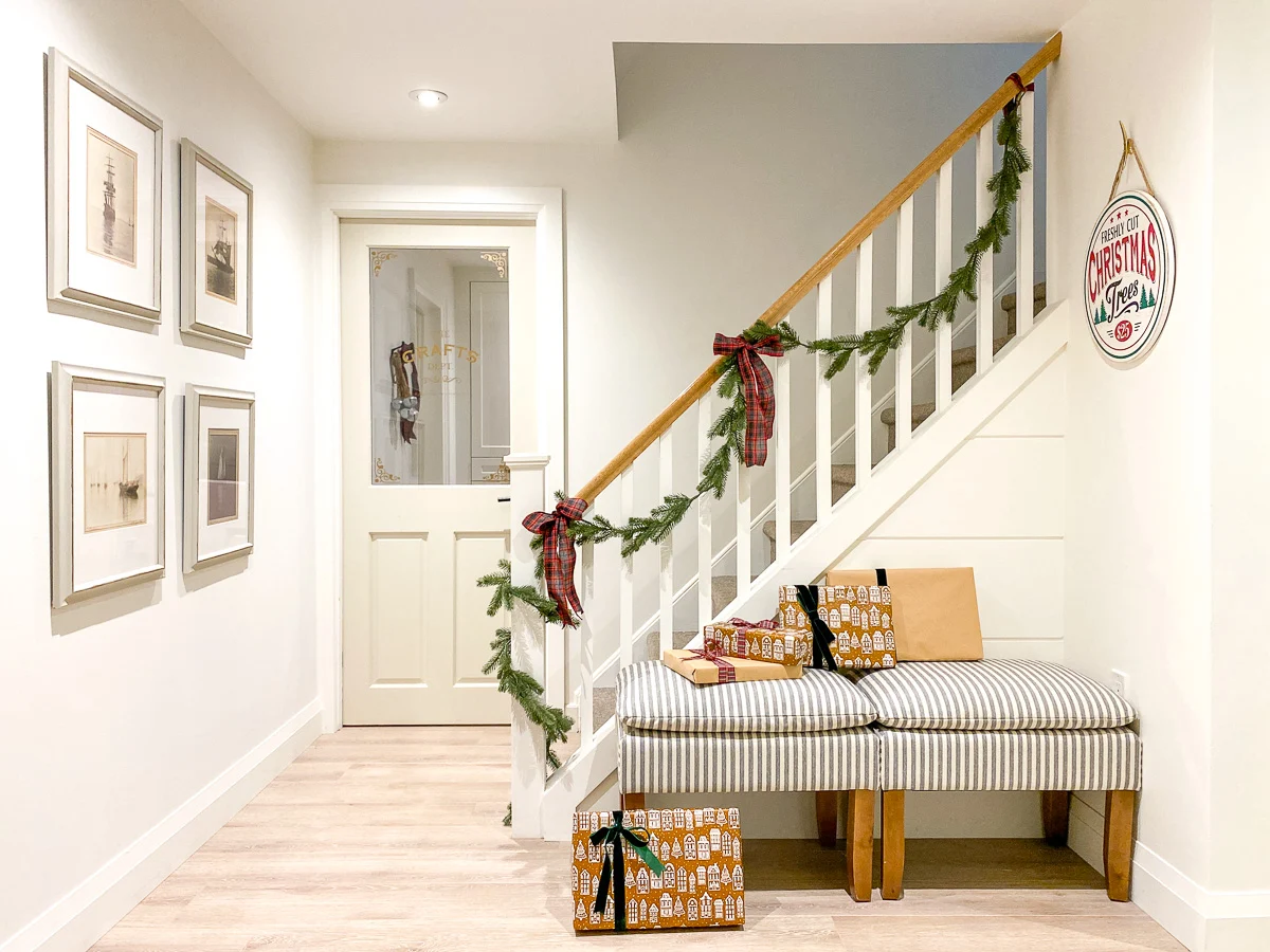 basement stair landing with christmas decorations