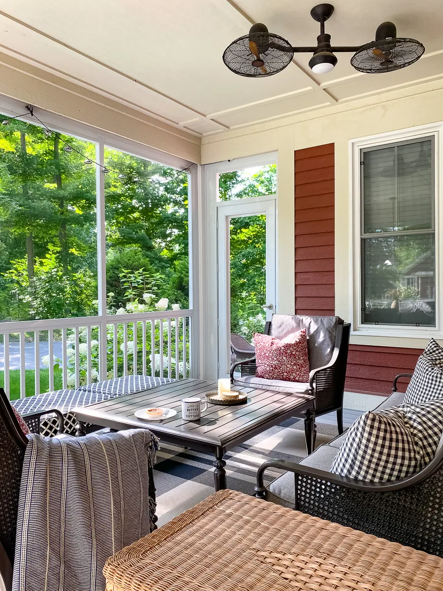screened in porch with outdoor lounge furniture