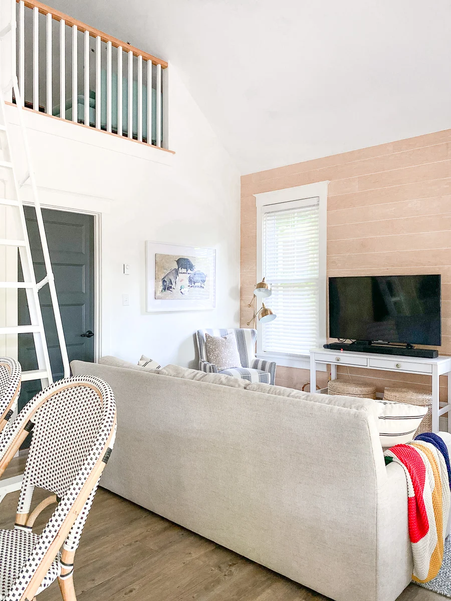 cottage living room with shiplap wall