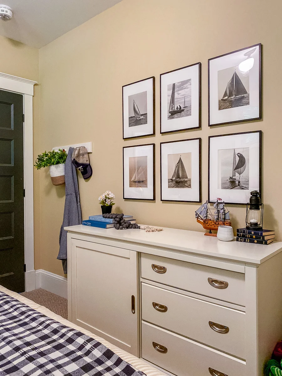 modern cottage bedroom decor with white furniture and nautical art
