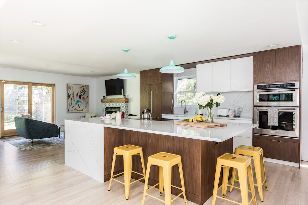 Marble kitchen island with sink and bar seating