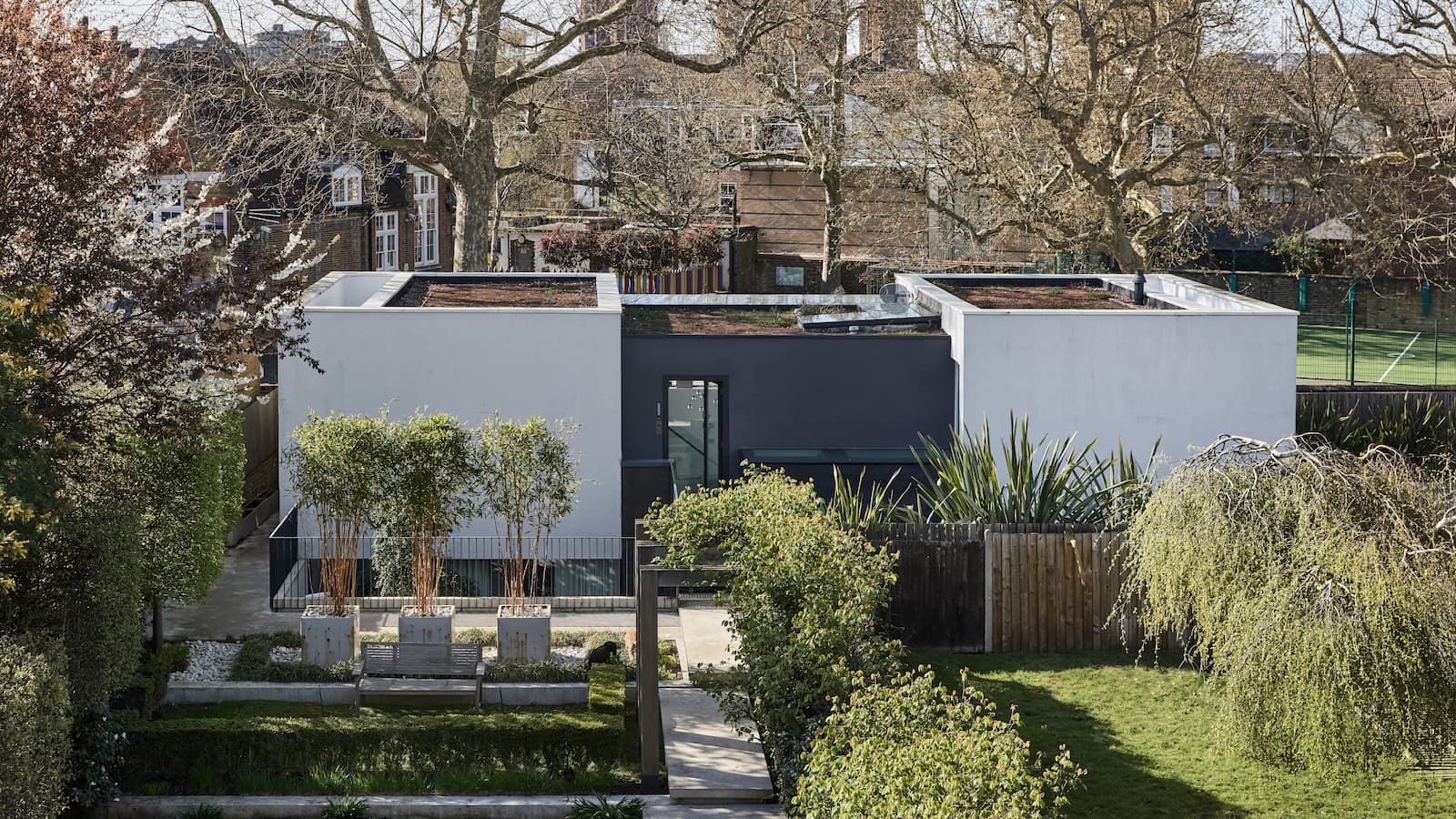 A self build with large glass and timber front