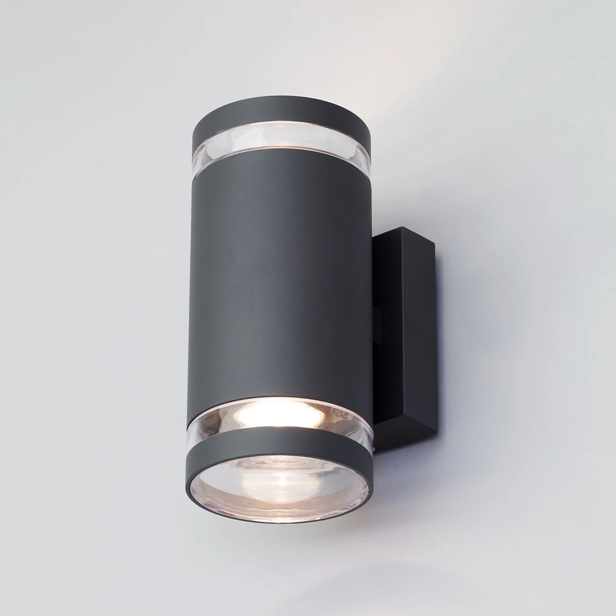 An up down outdoor porch light in brushed grey
