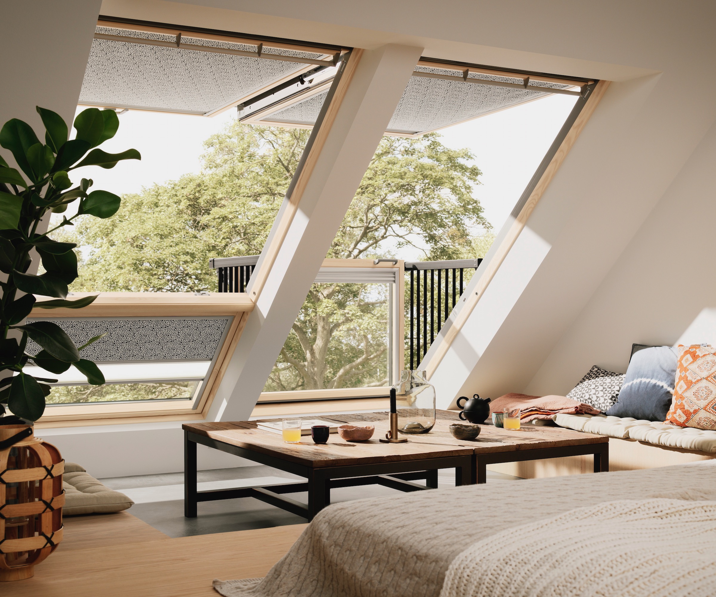 Loft conversion with roof window that converts into a balcony