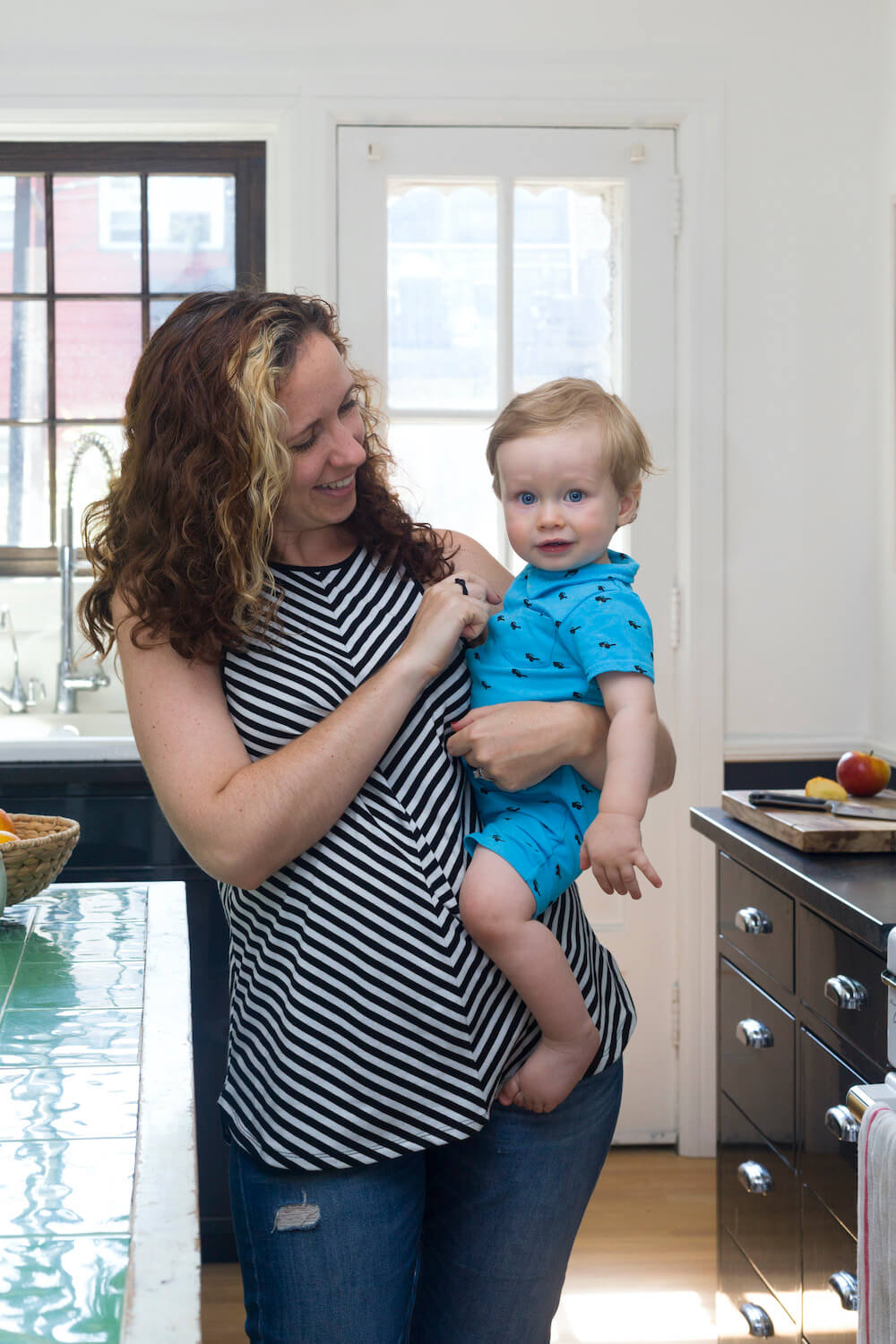 Homeowner with her baby