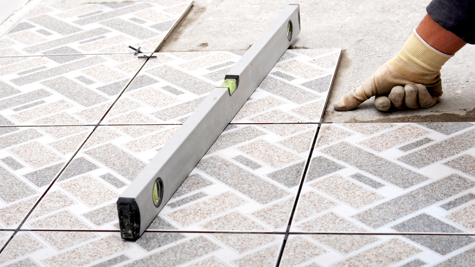 Tiling an uneven floor tips to achieve a flat and level surface