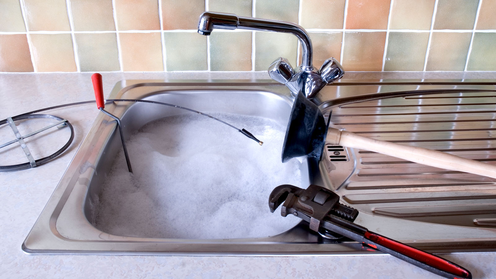 Experts reveal how to unblock a sink without a plunger