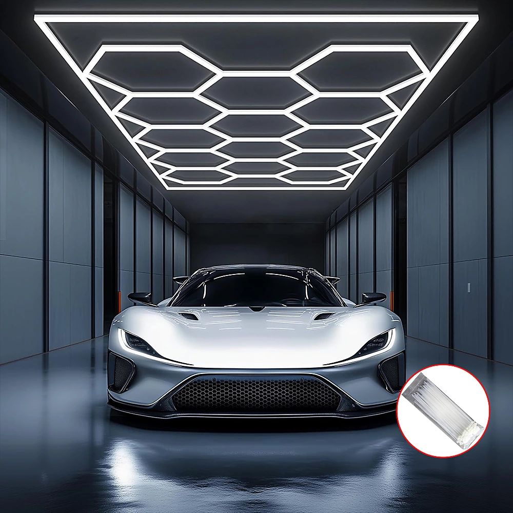 A sports car parked in a dark garage with hexagonal LED lighting on the ceiling