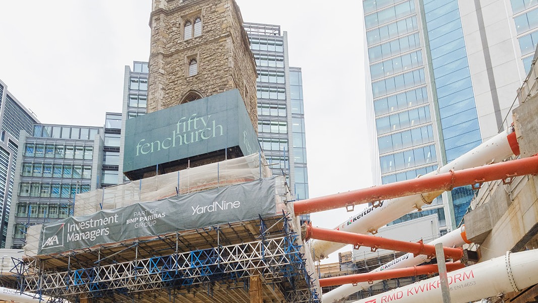 Medieval church tower suspended 14m above ground at City high-rise site