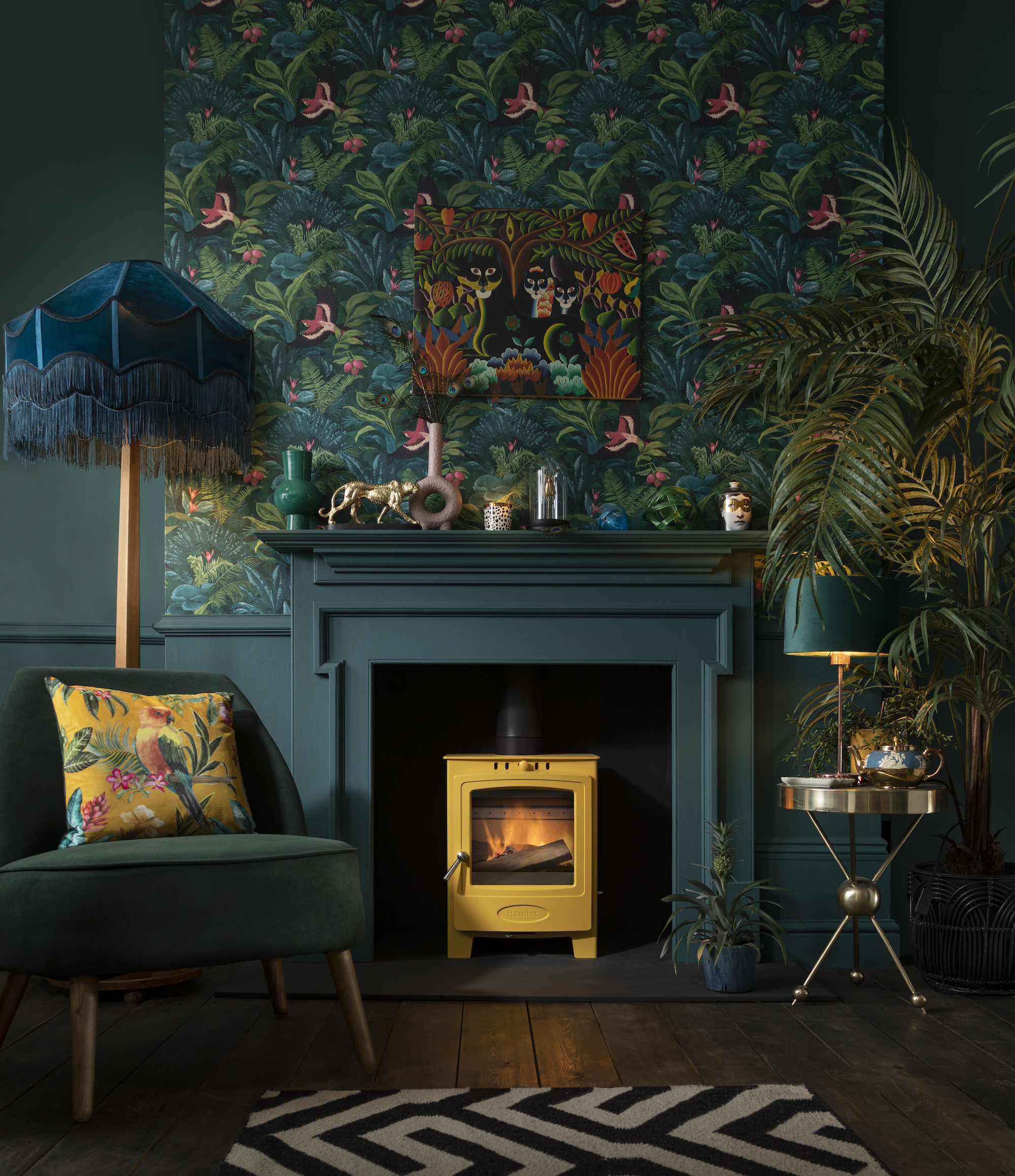 traditional fireplace in living room redecorated with patterned wall paper and green mantle