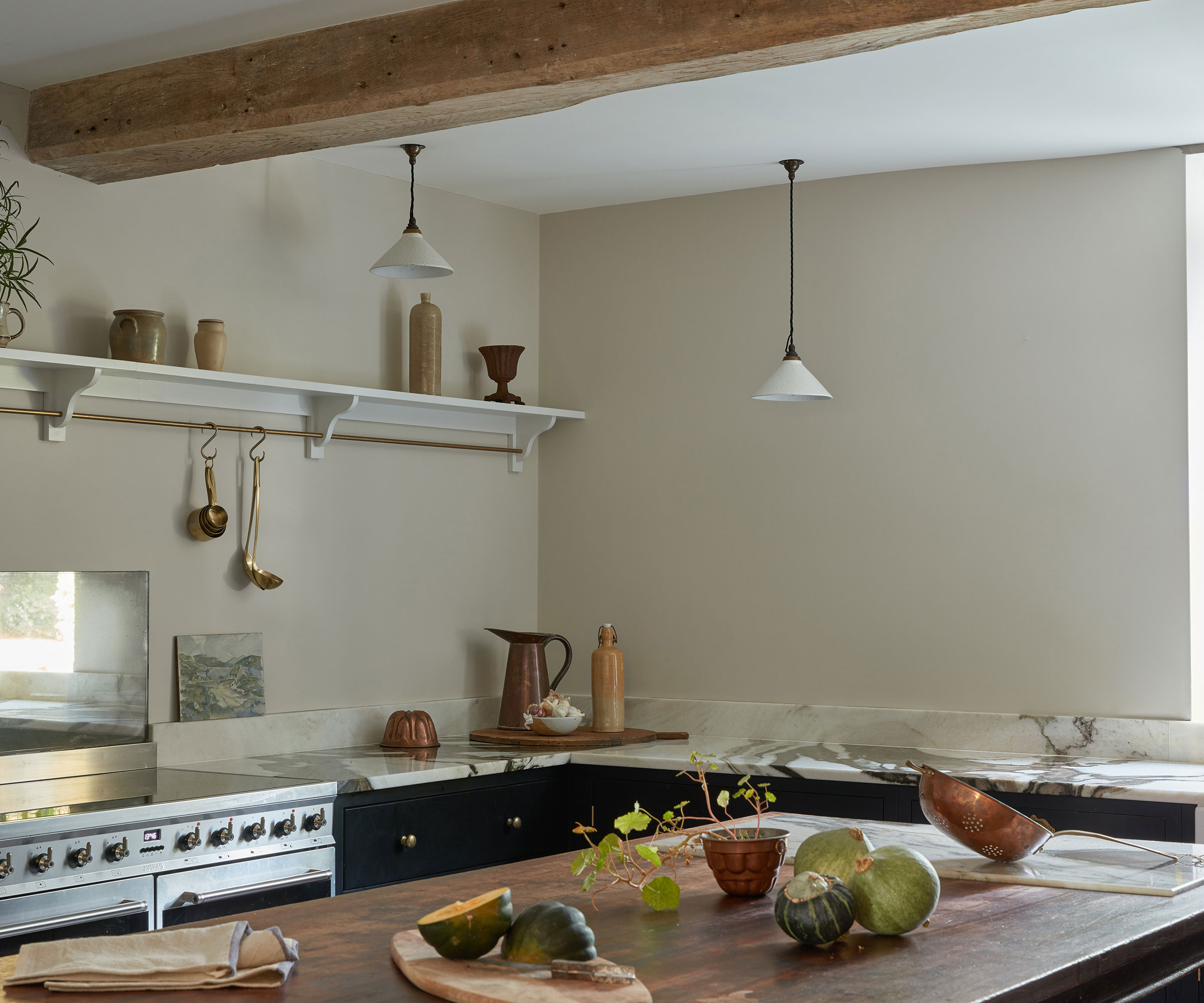 classic kitchen with chalk paint from Earthborn on the walls and marble worktop