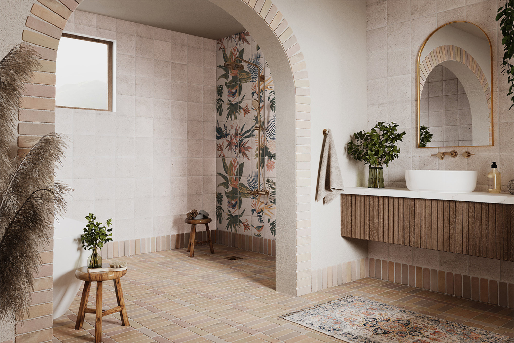 A bathroom with small white stone floor tiles