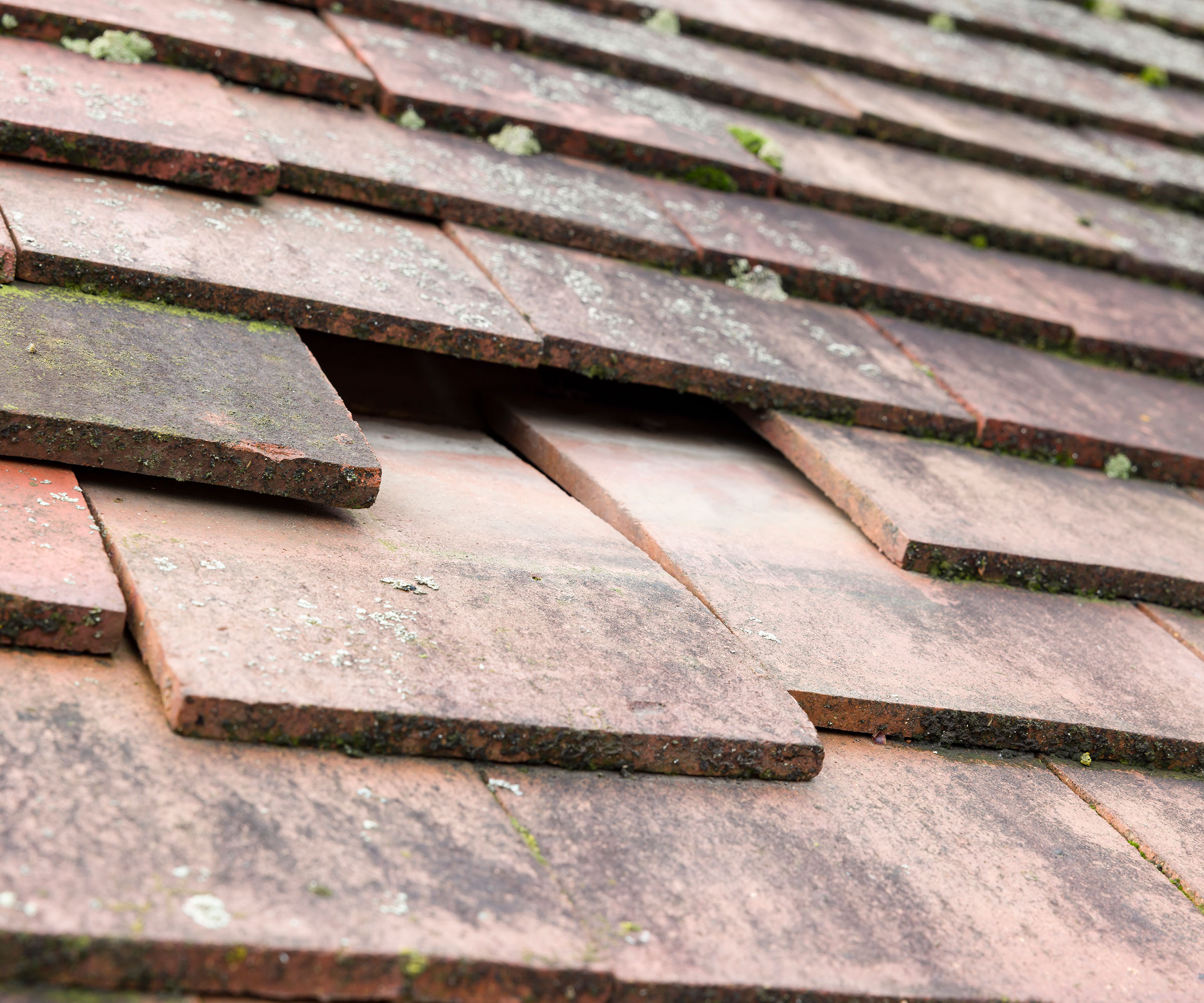 clay roof with missing roof tile