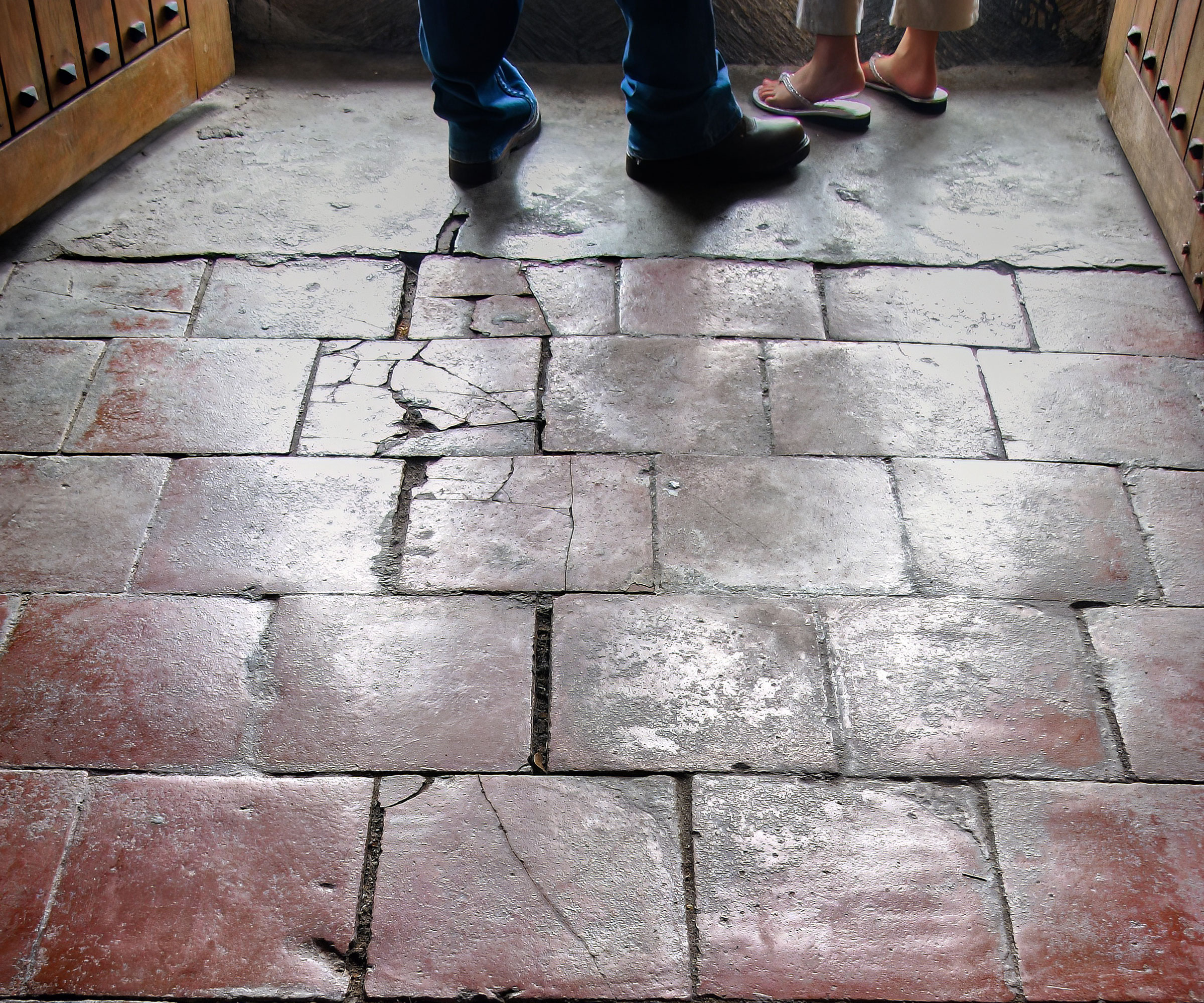 old quarry tiled floor in hallway