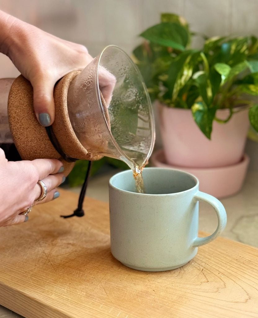 Pouring Pour Over Coffee Into Mug