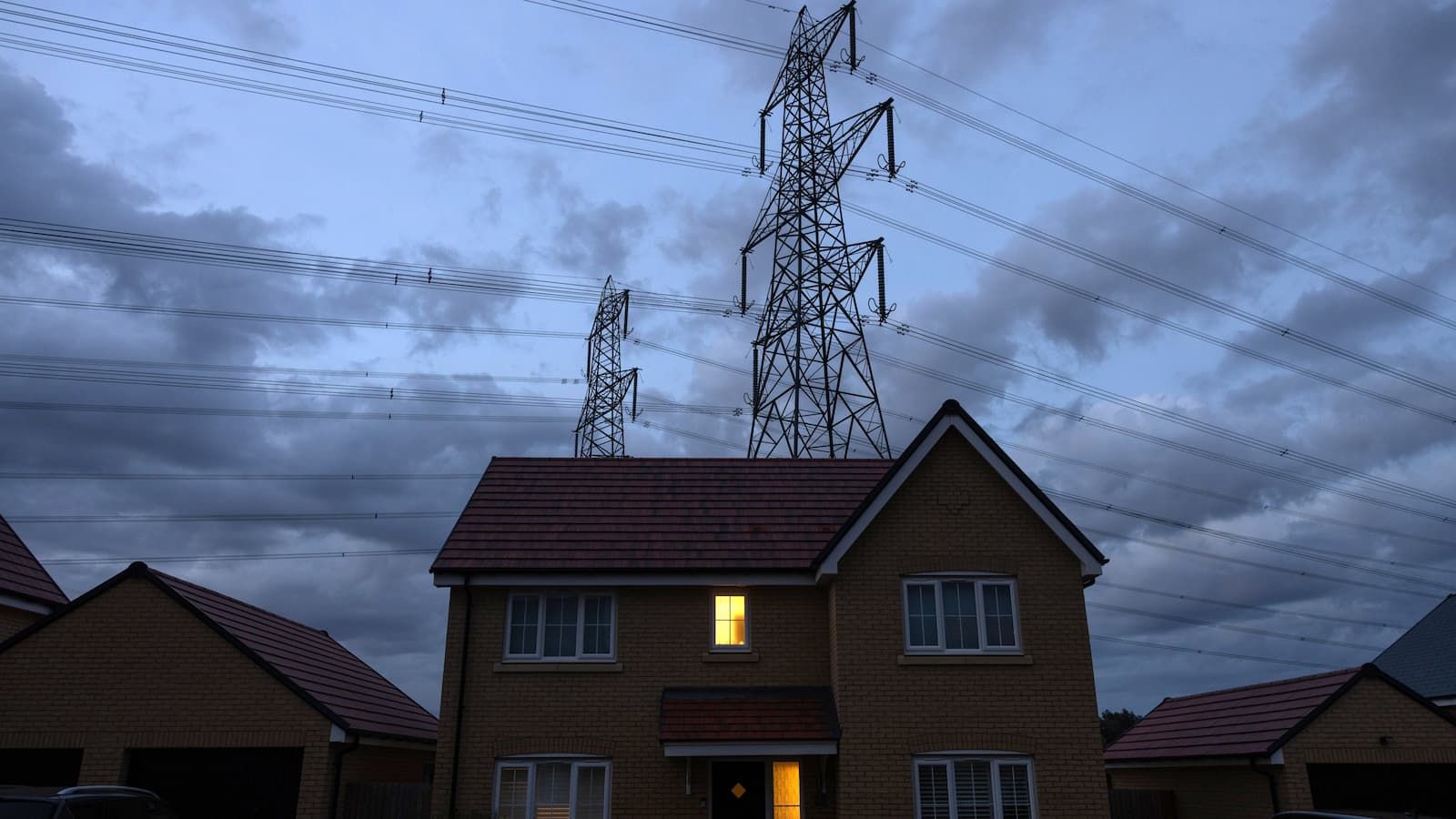Lights switched on in a new home near to electricity pylons in Bramford, UK, on Tuesday, Aug. 26, 2025