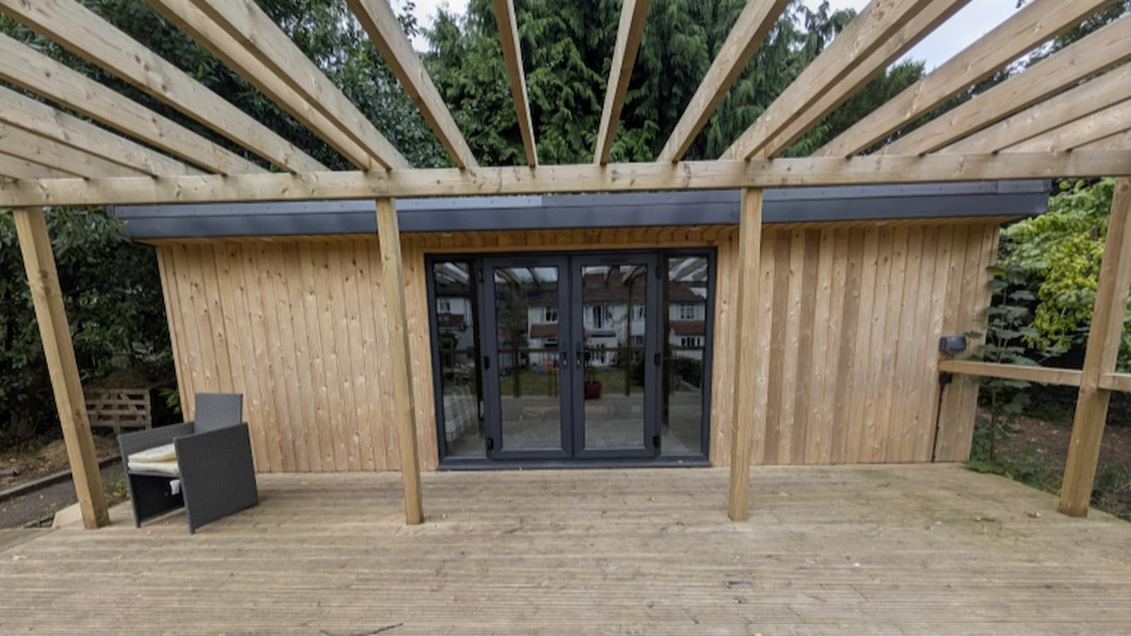 Council lets garden office stay, but under strict conditions