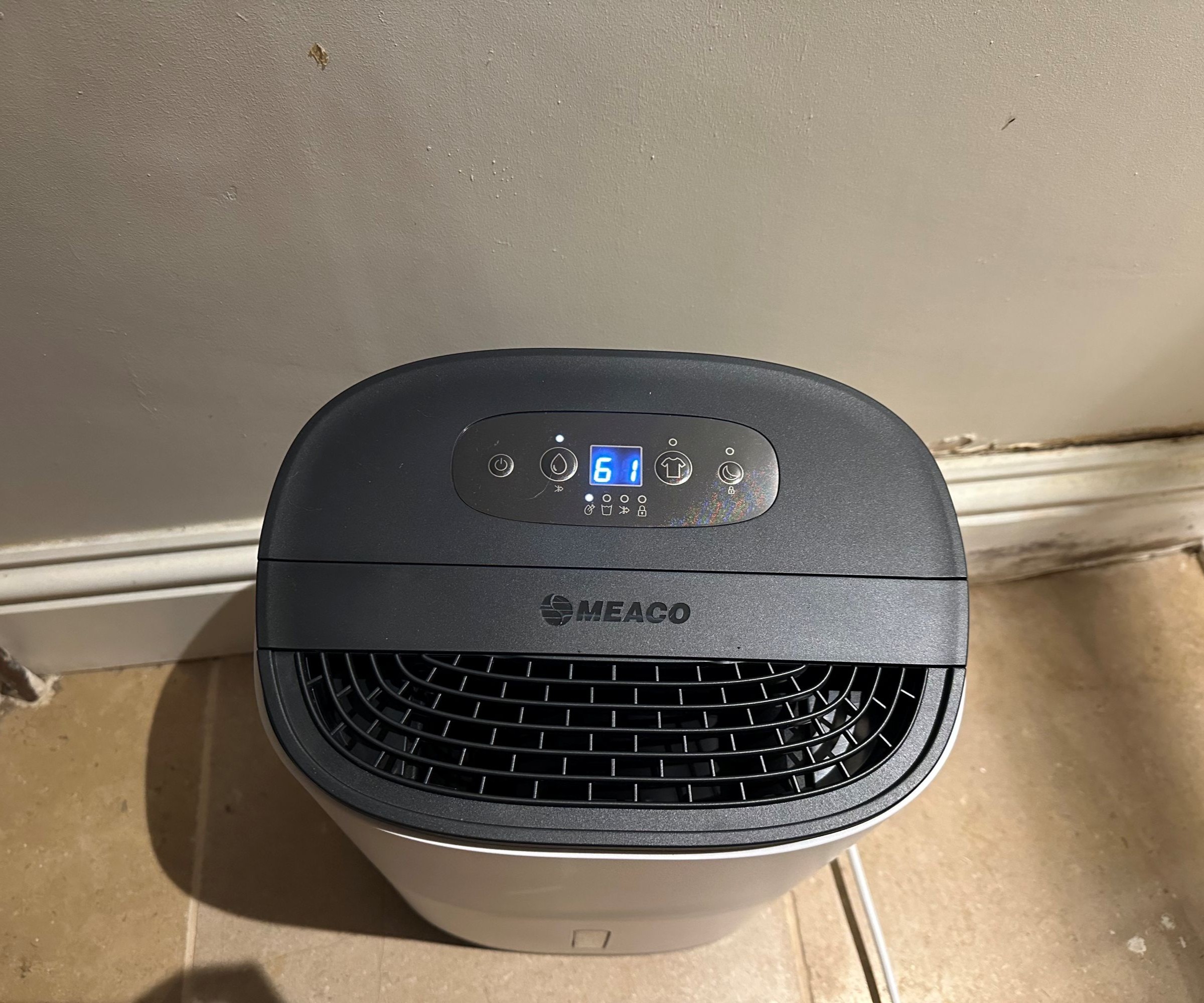 A top view of the control panel on the MeacoDry Arete One 6L Compact dehumidifier