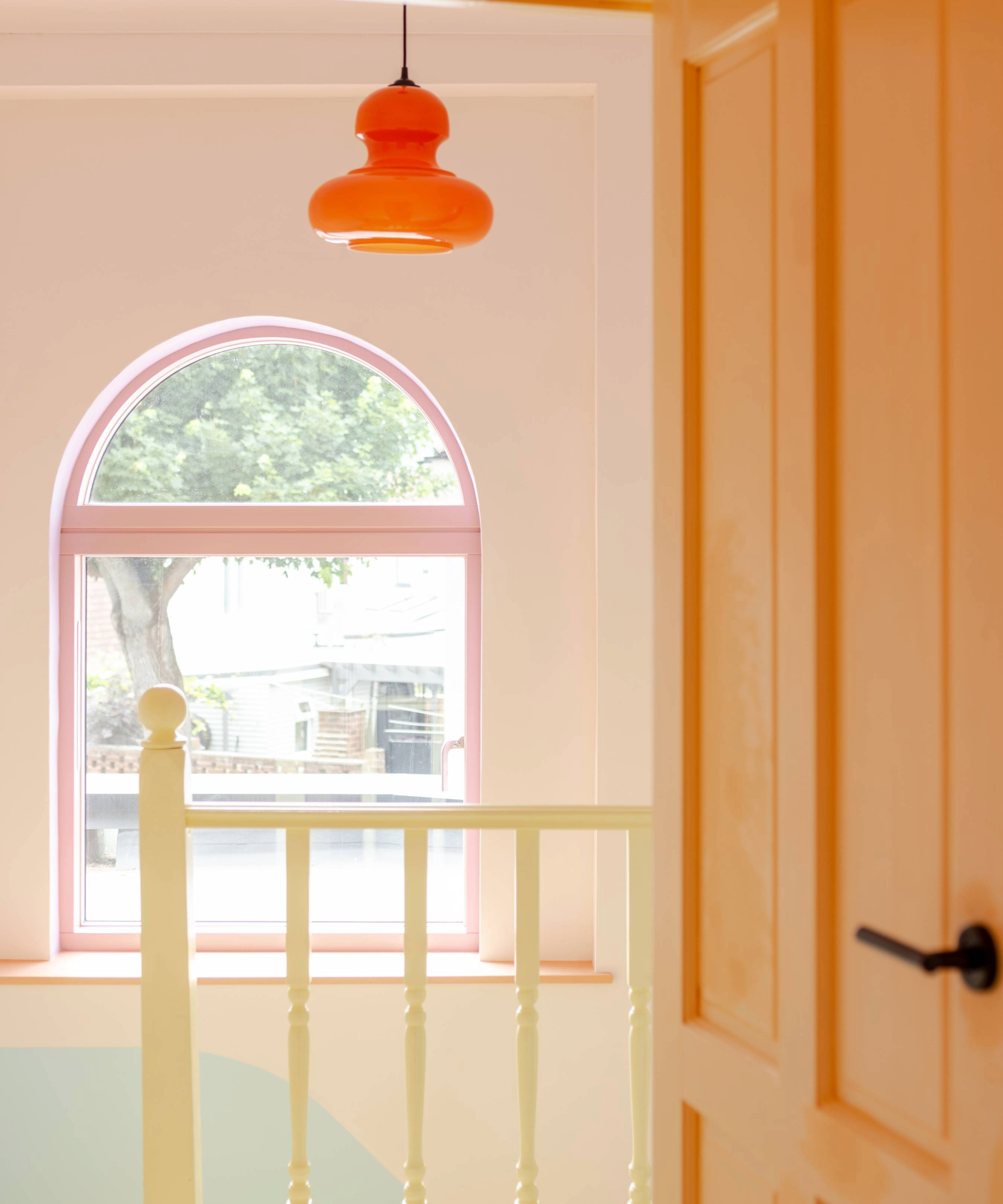 View from the stop of the staircase which features a curved window