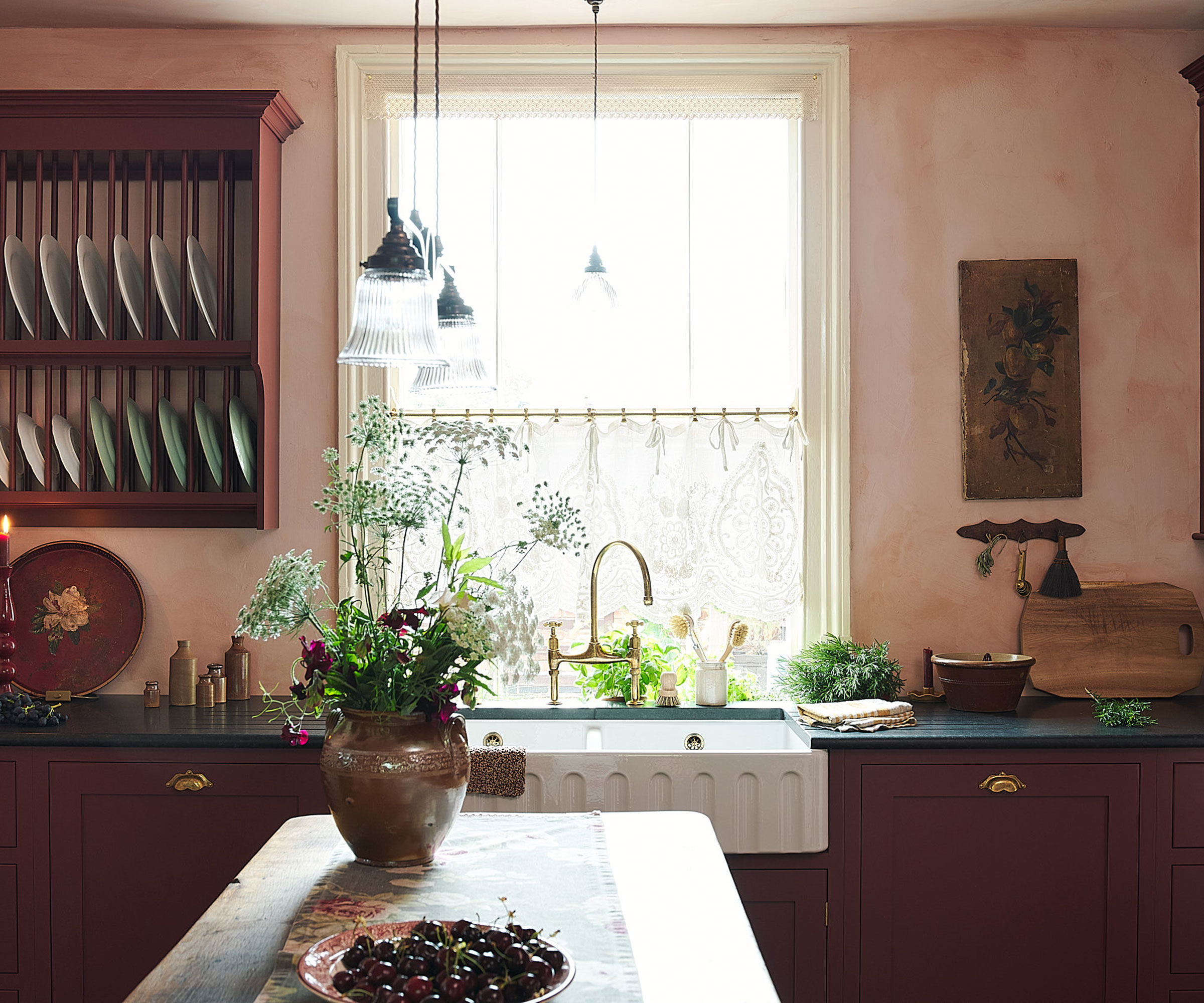 small red Shaker kitchen with small kitchen island