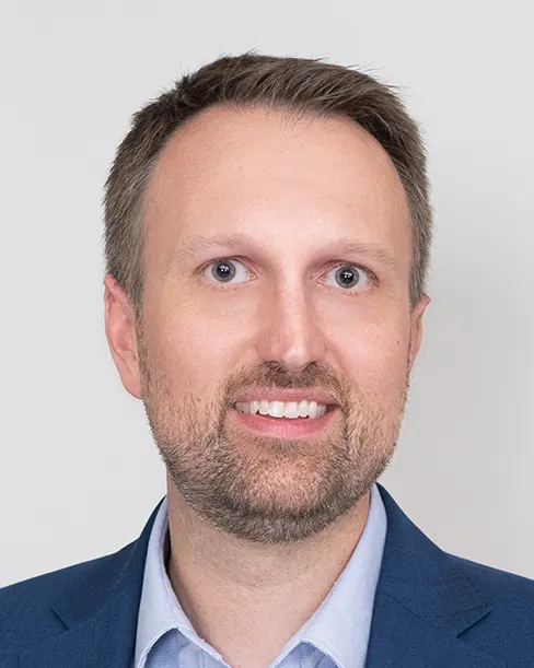 A headshot of Will Senner